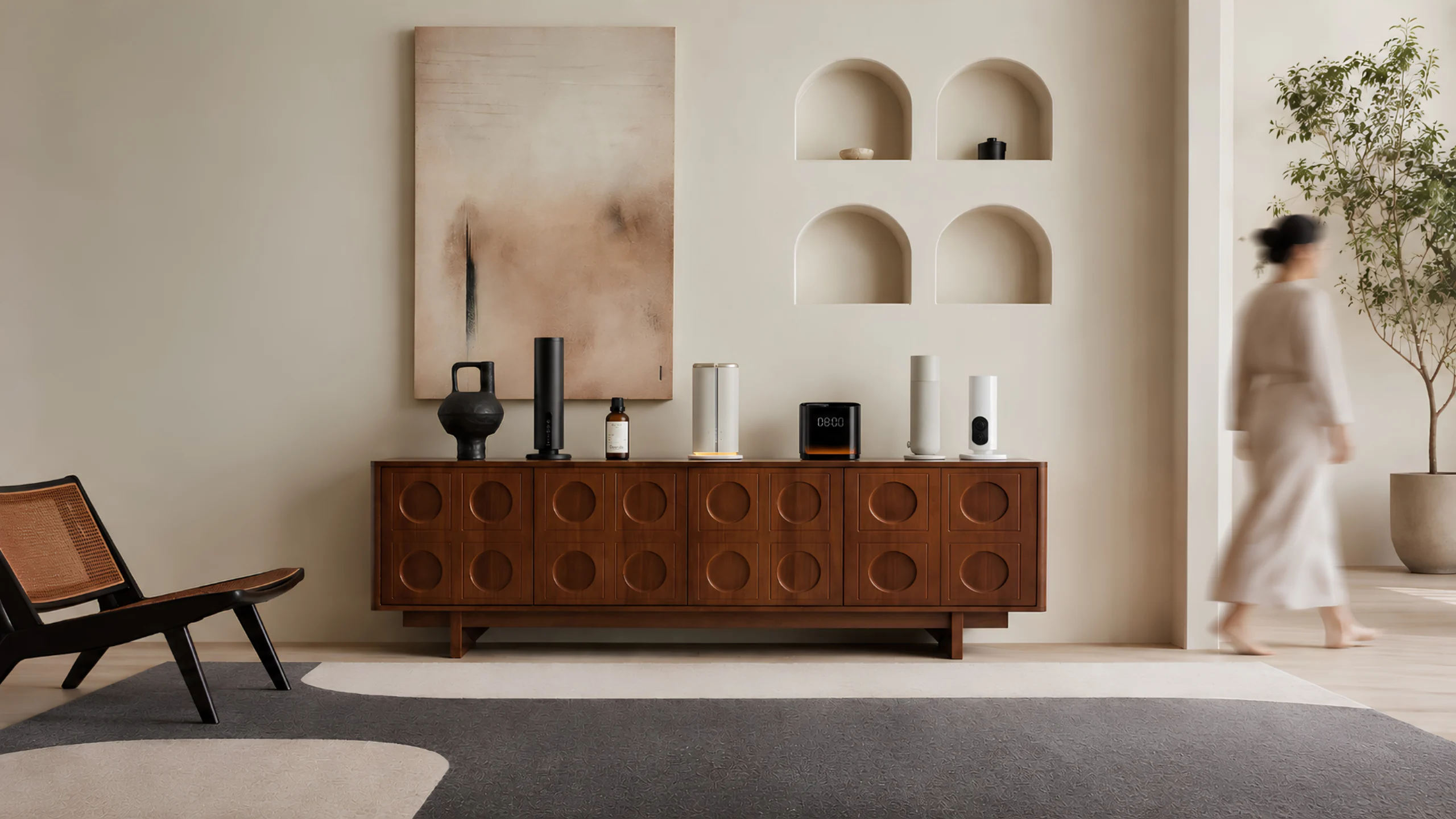 The Quint range arranged along a walnut sideboard in a sunlit room