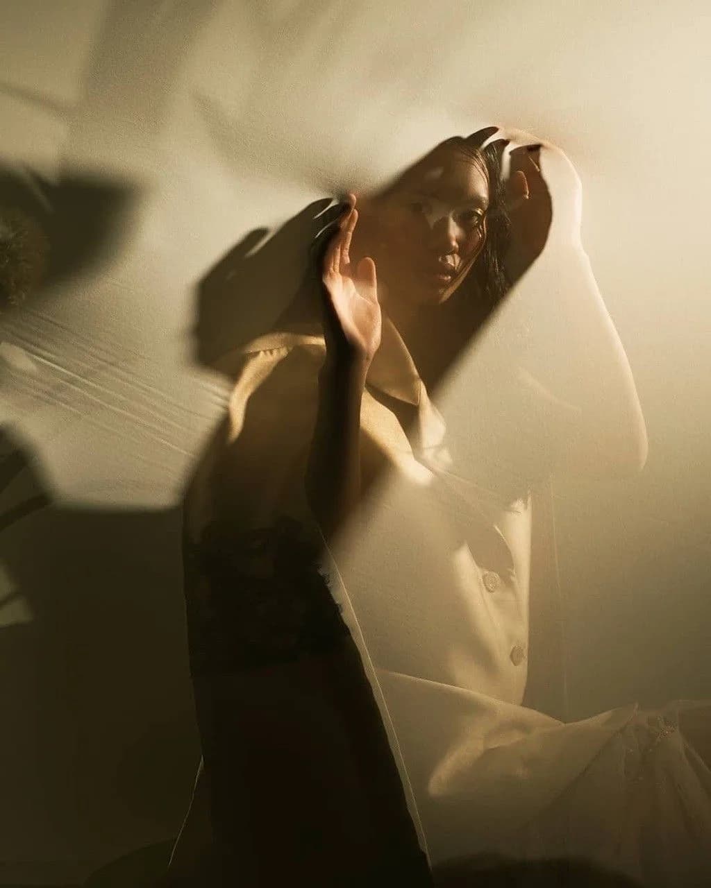 Soft morning light through a curtain